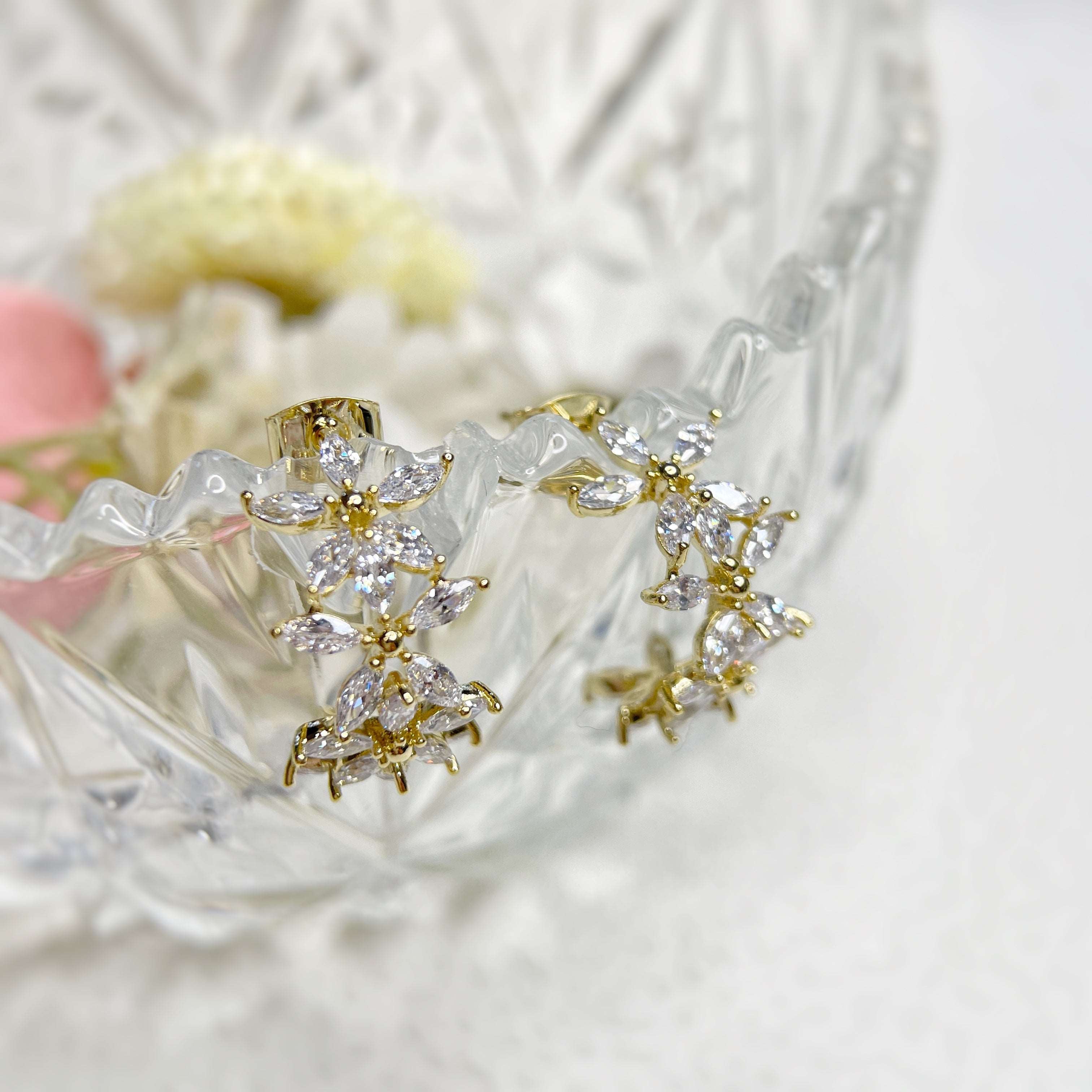 Pair of cute and elegant gold hoop earrings for women and girls, crafted with sparkle bling cubic zirconia in wildflower design which are hypoallergenic to prevent ear allergies, ideal gift for her - Sisilia Jewels