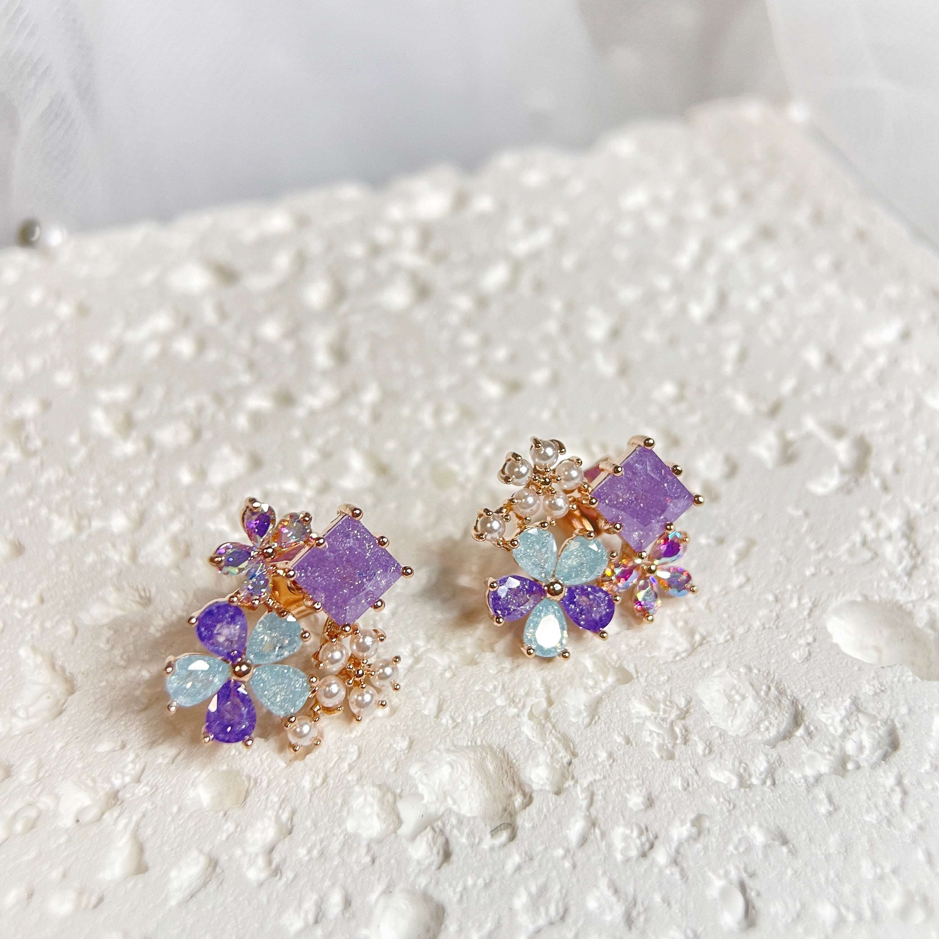 Pair of multi colored stone earring studs crafted with tiny pearls, sparkle crystals, amethyst and aquamarine in dream ethereal bloom style - Sisilia Jewels