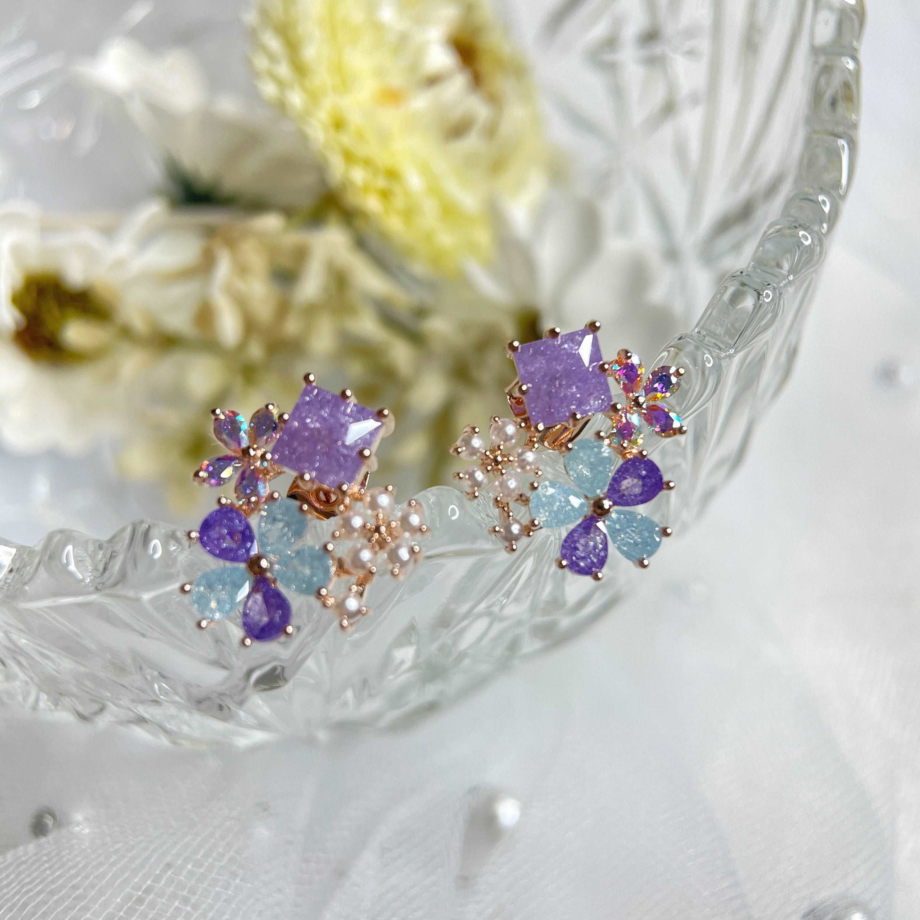 Pair of multi colored stone earring studs crafted with tiny pearls, sparkle crystals, amethyst and aquamarine in dream ethereal bloom style - Sisilia Jewels