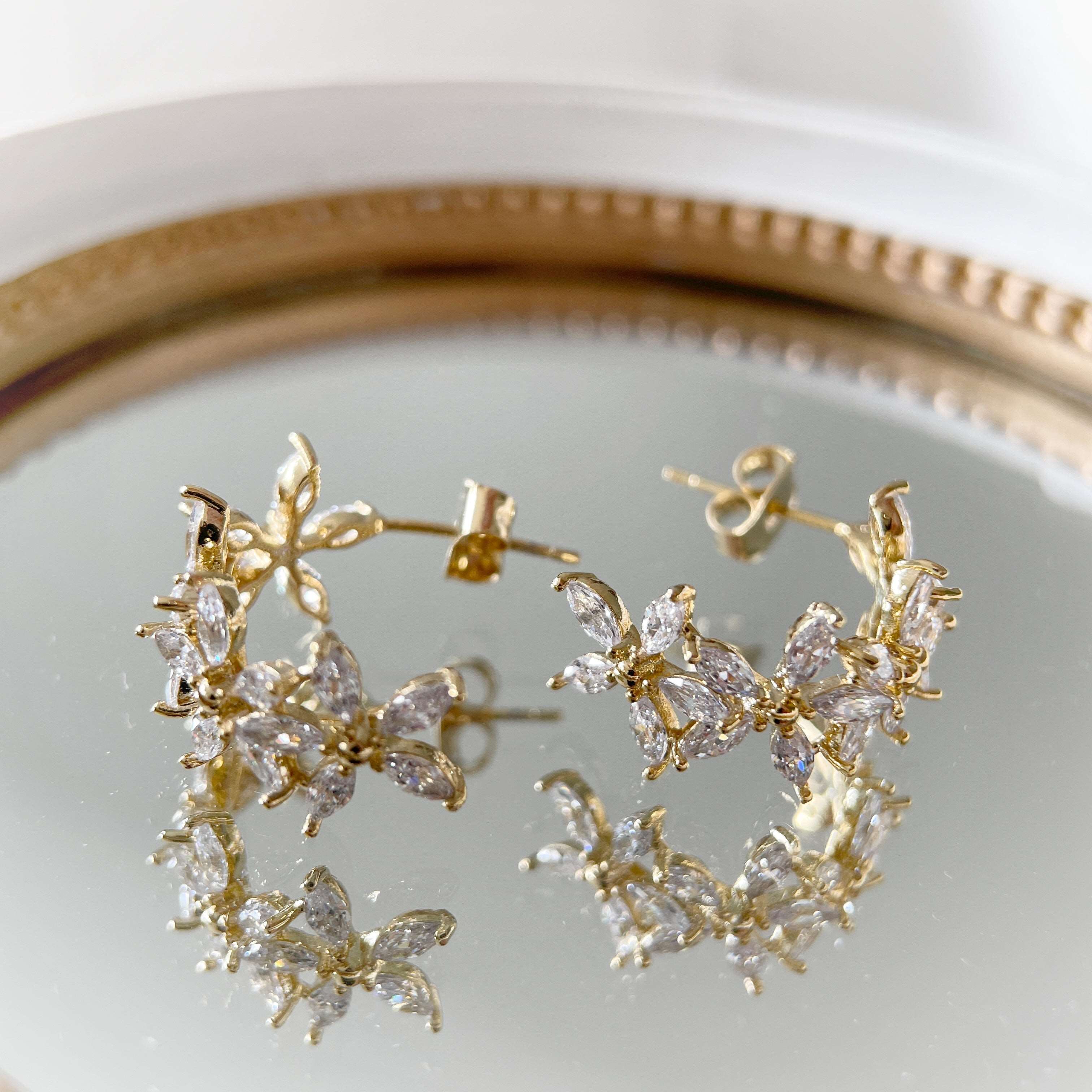 Pair of cute and elegant gold hoop earrings for women and girls, crafted with sparkle bling cubic zirconia in wildflower design which are hypoallergenic to prevent ear allergies, ideal gift for her - Sisilia Jewels