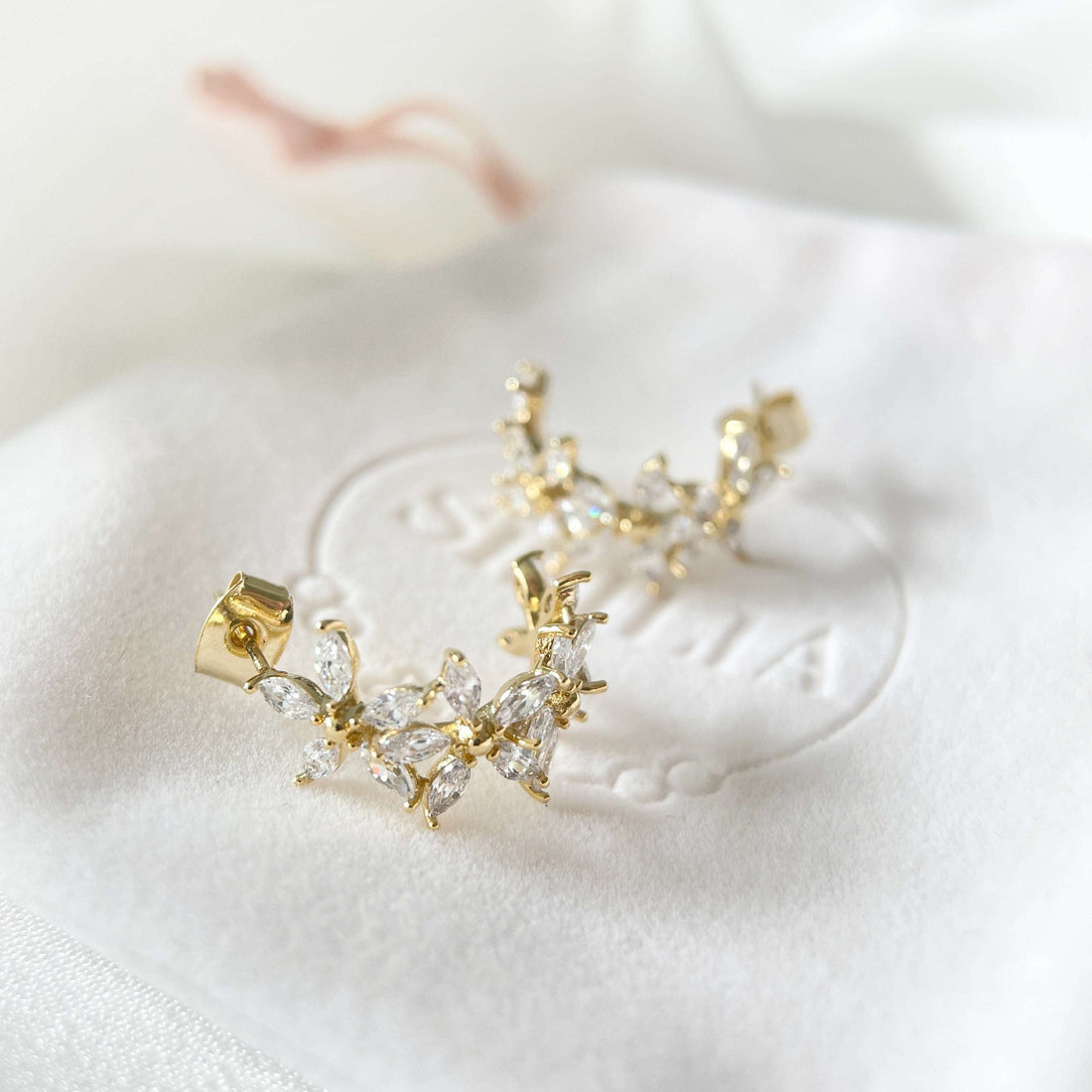 Pair of cute and elegant gold hoop earrings for women and girls, crafted with sparkle bling cubic zirconia in wildflower design which are hypoallergenic to prevent ear allergies, ideal gift for her - Sisilia Jewels