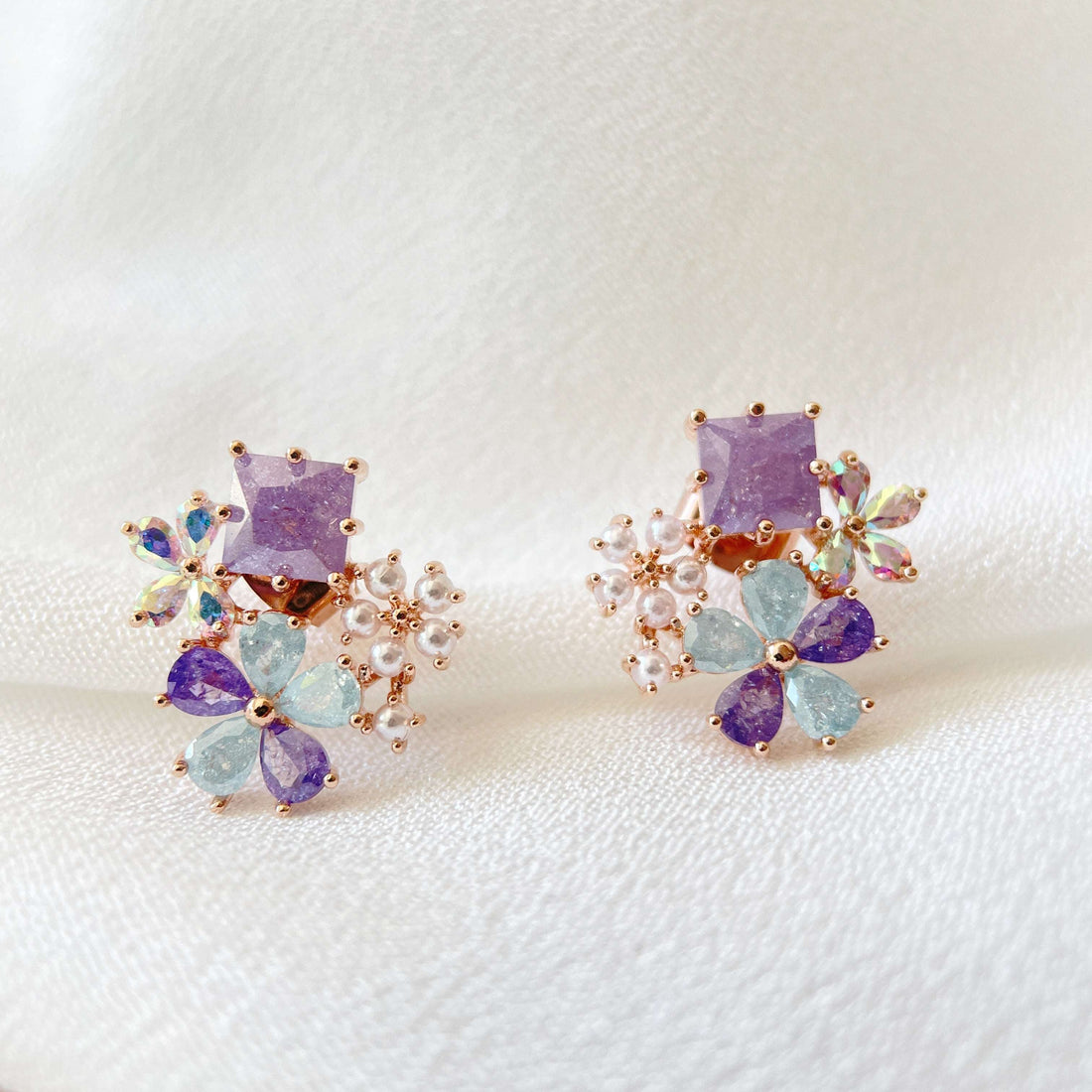 Pair of multi coloured stone earring studs crafted with tiny pearls, sparkle crystals, amethyst and aquamarine in dream ethereal bloom style - Sisilia Jewels