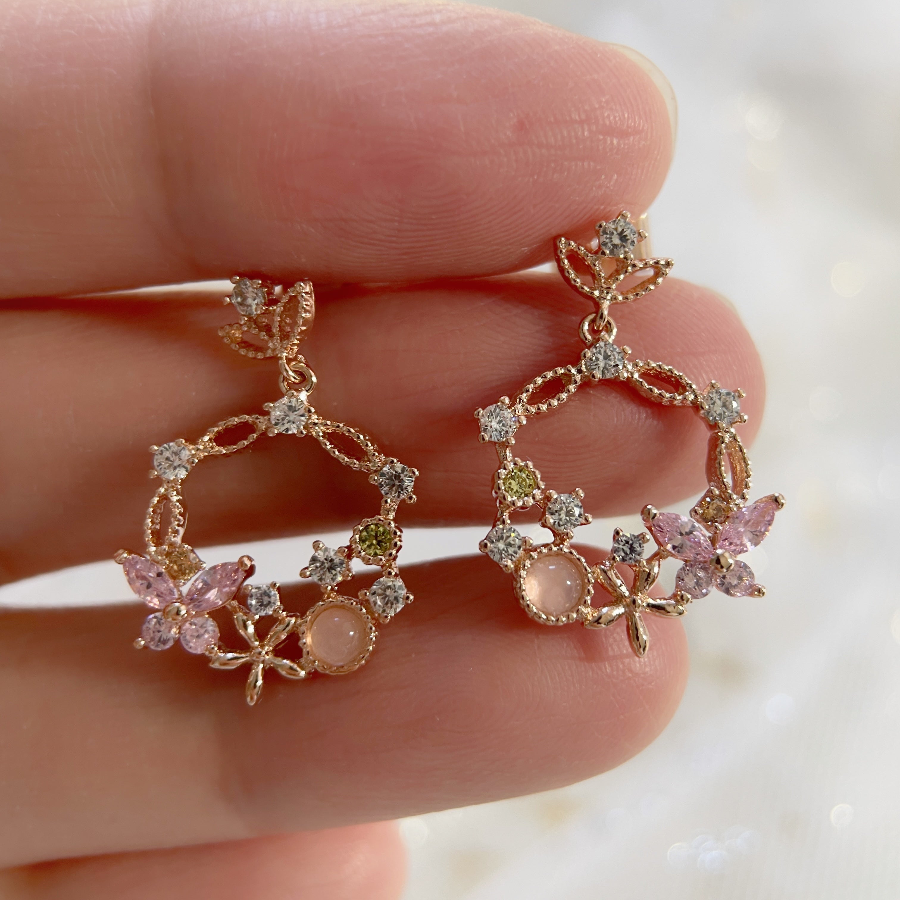 Rose gold butterfly and flower design drop earrings crafted with sparkle multi colored stones - Sisilia Jewels