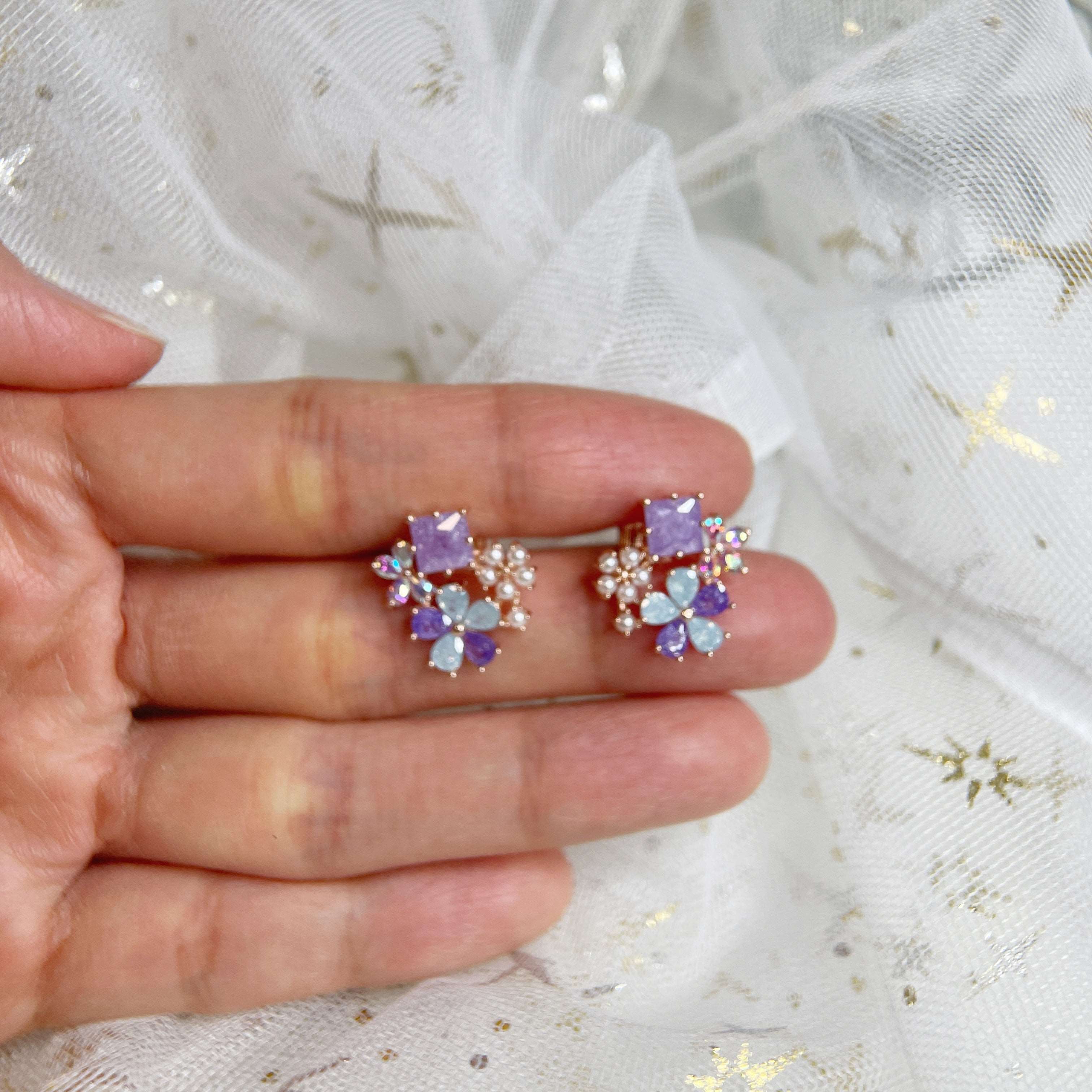 Pair of multi colored stone earring studs crafted with tiny pearls, sparkle crystals, amethyst and aquamarine in dream ethereal bloom style - Sisilia Jewels