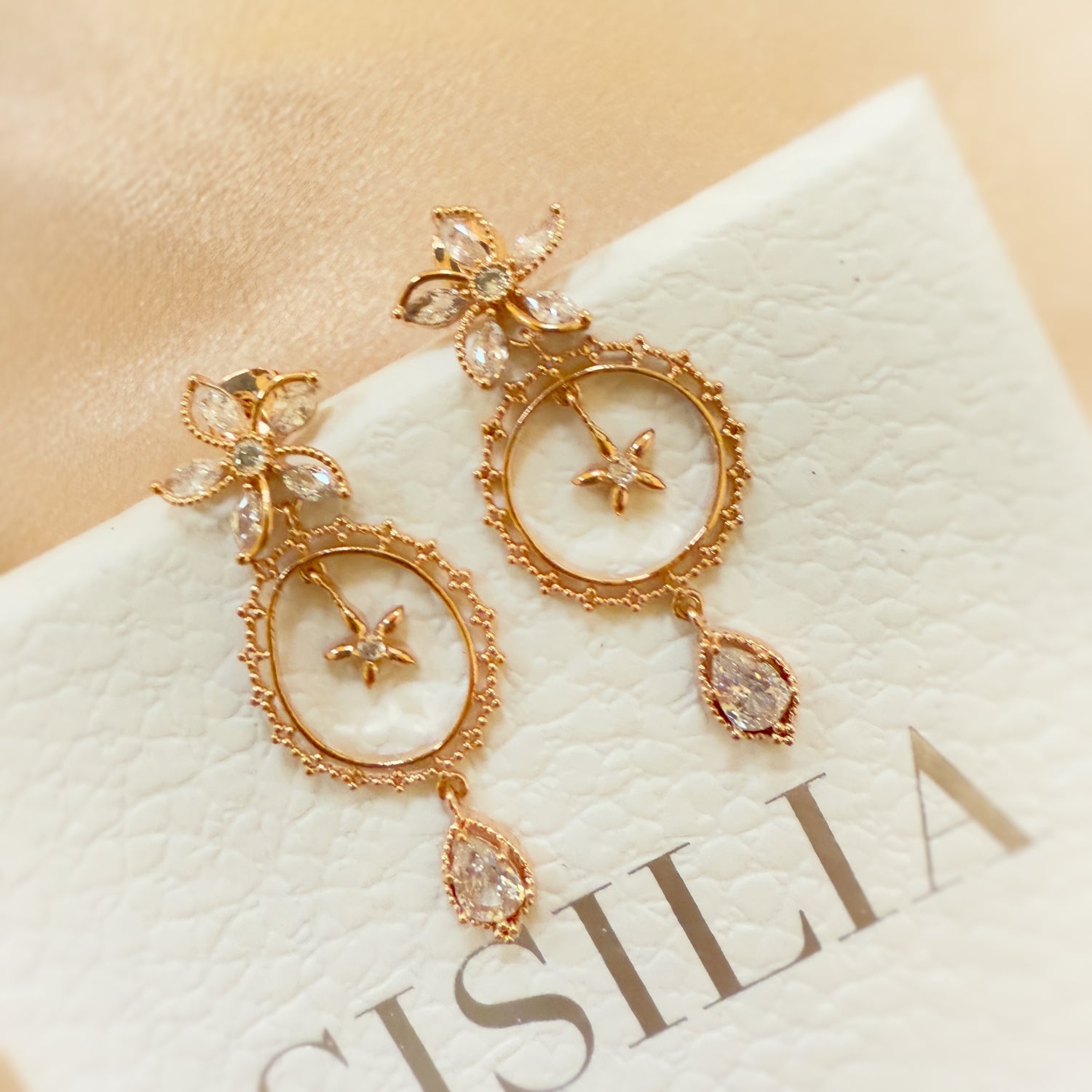 Rosegold Petal Sparkle Dangle Earrings