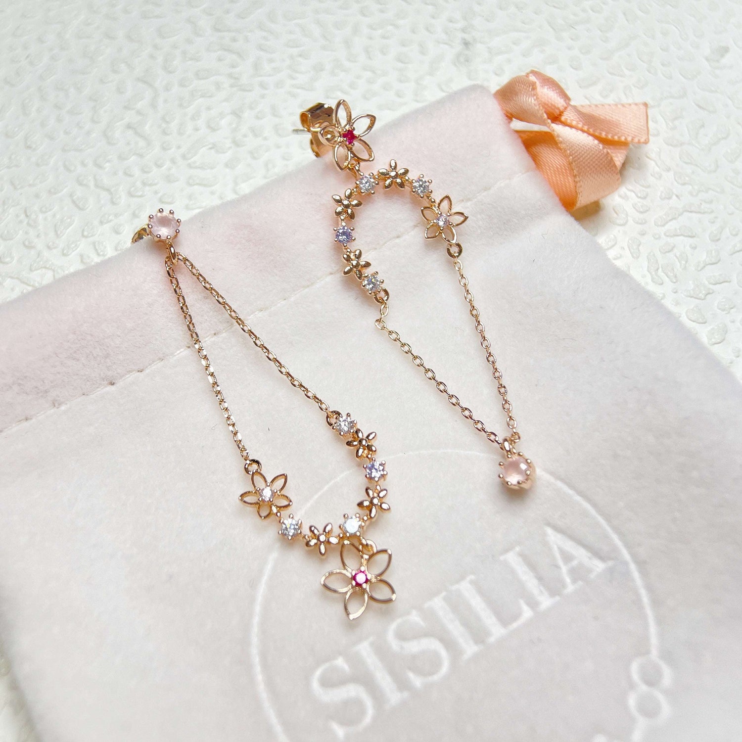 air of rose gold mismatched earring dangles, crafted with multi colored sparkle gemstones and cubic zirconia. A perfect Christmas Gift for Her - Sisilia Jewels