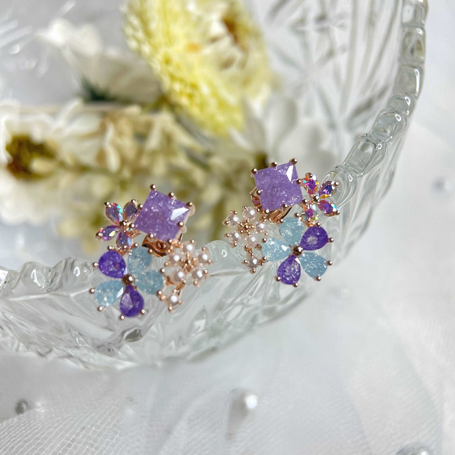 Pair of  multi colored stone earring studs crafted with tiny pearls, sparkle crystals, amethyst and aquamarine in dream ethereal bloom style - Sisilia Jewels