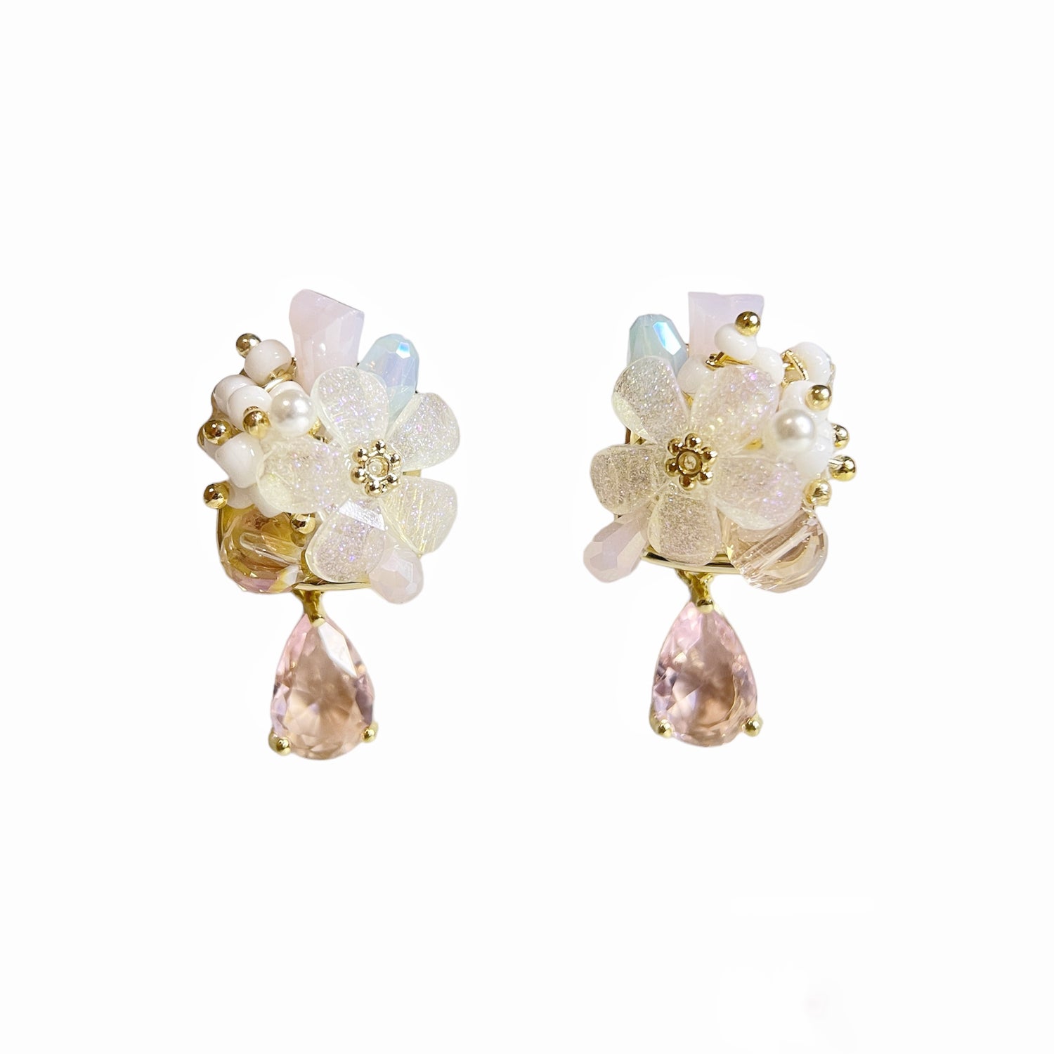 A pair of multi colored stone five petals flower bloom earrings with pink teardrop on white background - Sisilia Jewels