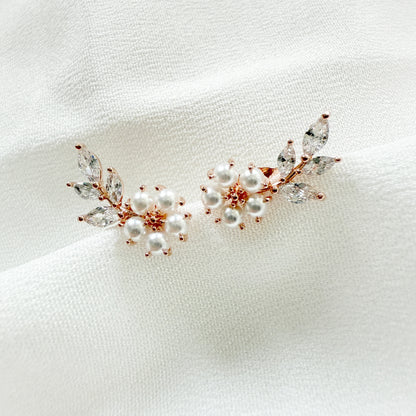 Crafted with tiny pearls for flower design with sparkly cubic zirconia leaves branch which looks like a wing. Nature-inspired design in dainty dreamy cute minimalist  style for everyday wear