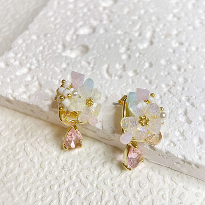 A pair of multi colored stone five petals flower bloom earrings with pink teardrop on white background - Sisilia Jewels