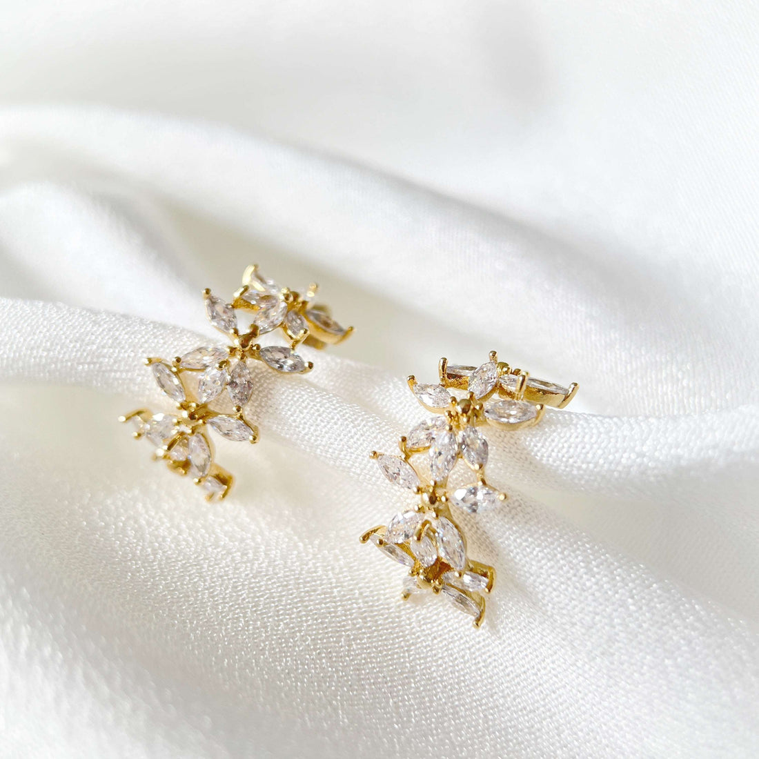 Pair of cute and elegant gold hoop earrings for women and girls, crafted with sparkle bling cubic zirconia in wildflower design which are hypoallergenic to prevent ear allergies, ideal gift for her - Sisilia Jewels