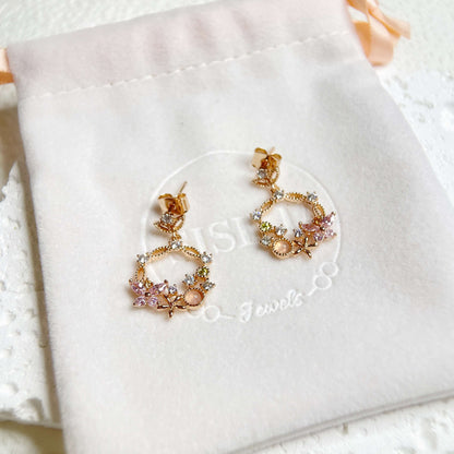 Pair of Rose Gold Drop earrings crafted with pink gemstone in butterfly design enriched by a flower wreath highlighted by Cubic Zirconia. Ideal  colorful Jewelry gift for her in different occasions - Sisilia Jewels