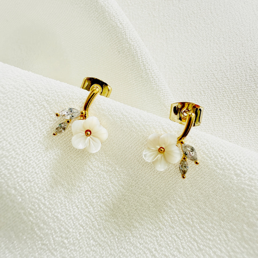 14k gold plated brass earring studs crafted with mother-of-pearls and sparkly cubic zirconia which is a thoughtful jewelry gift for her on everyday wear or special occassions