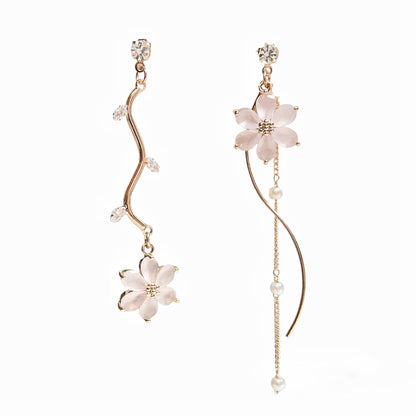 Mismatched earrings in six petals pink flower hanging on rose gold flower stems - Sisilia Jewels