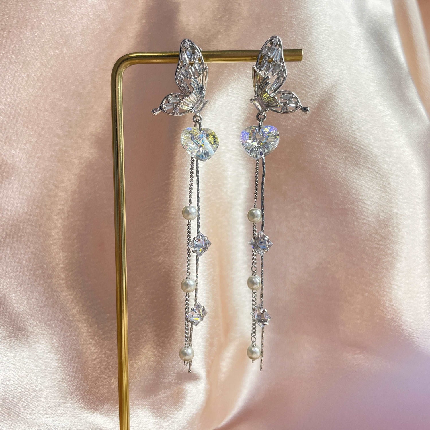 Earring dangles with paved butterfly wing design ,a heart shaped Swarovski Crystal and long tassels - Sisilia Jewels